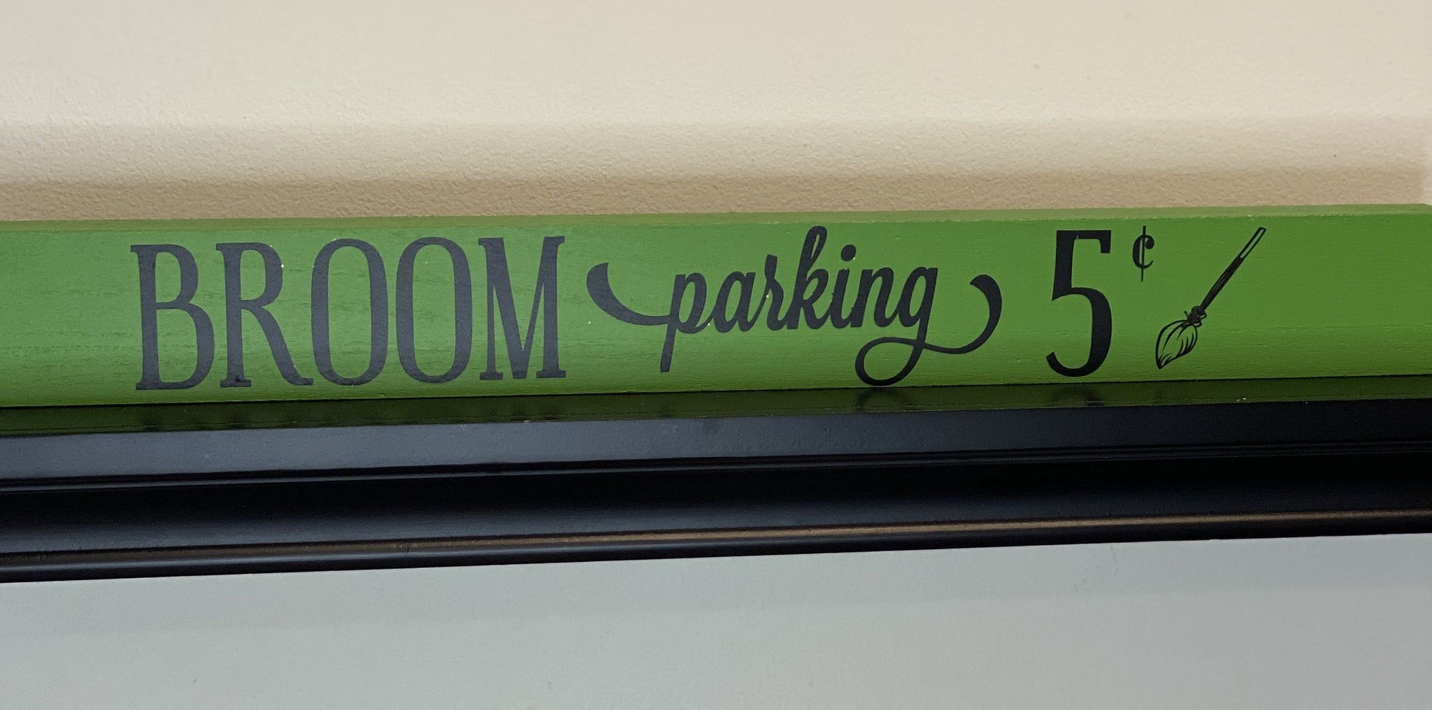 Broom Parking 5 cents Sign