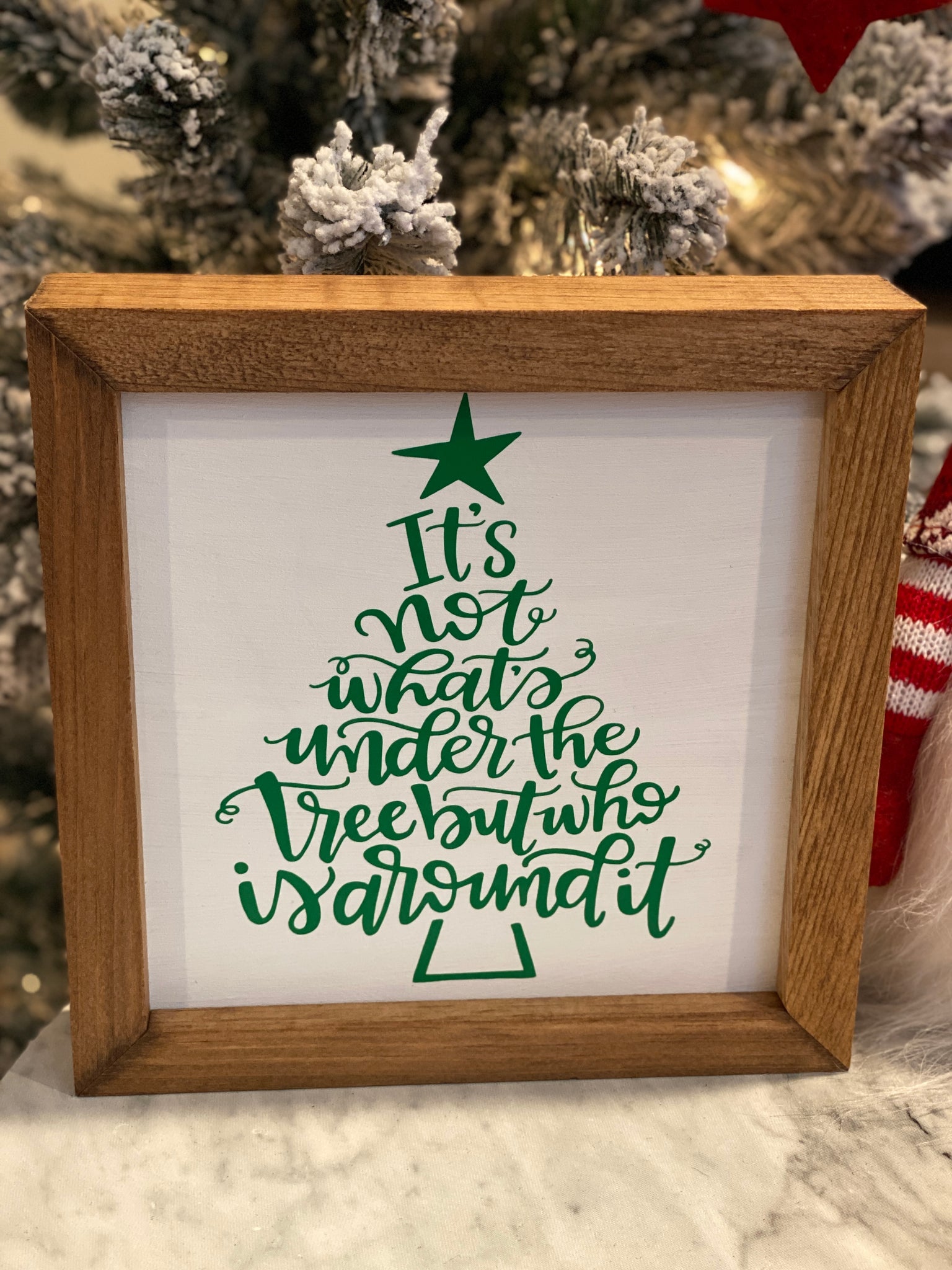 It's Not What's Under the Tree But Who is Around It Sign